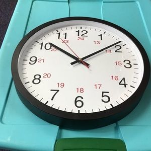 Universal Wall Clock 12 1/2” diameter Black Frame White Face